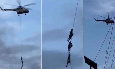 হেলিকপ্টারের দড়িতে ঝুলে পালাচ্ছেন নেপালের মন্ত্রীরা 